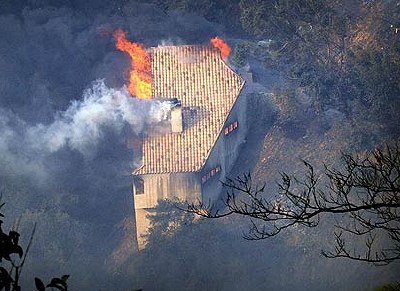 House on fire. Photo by The Los Angeles Times.